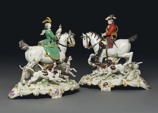 A PAIR OF MEISSEN EQUESTRIAN FIGURES OF A HUNTSMAN AND LADY FALCONER 